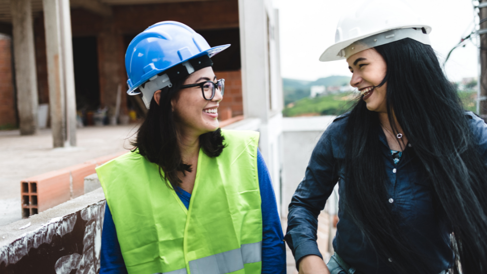 Two women business owners managing a construction site