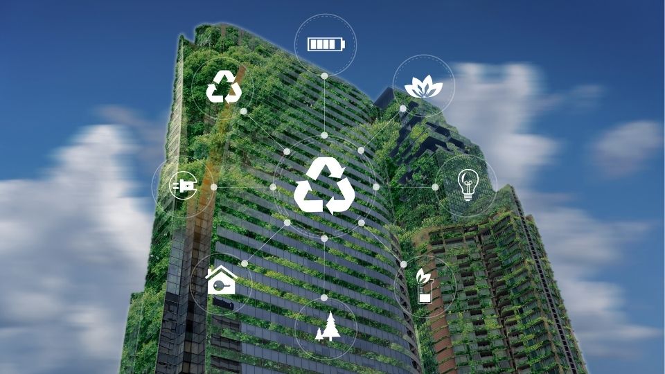  una imagen de un edificio verde, que representa los beneficios de convertirse en un negocio sostenible