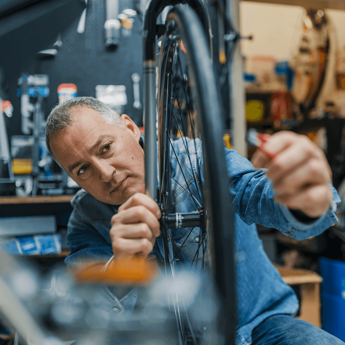 Merchant Working on Bike